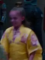 Purple-skinned alien kid