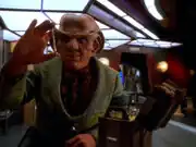 Quark holding a vial of liquid data chains