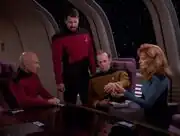 Reginald Barclay in the observation lounge with senior staff