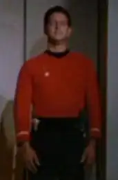 Roger Lemli standing by the turbolift