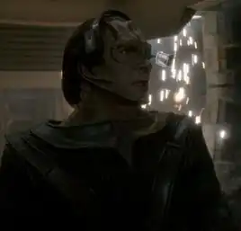 Seskal on the bridge of a Dominion ship