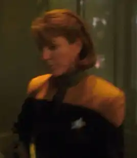 ... as Crewman Sharr