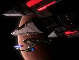 Port ventral view, facing a Galaxy-class starship