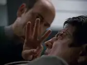 The Doctor treating Chakotay