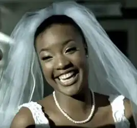 Collie as the bride in the 2008 Keyshia Cole music video "You Complete Me"