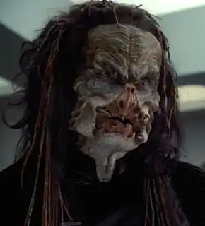 Treen, a Kradin male in 2374