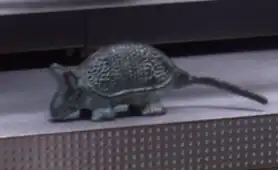 A figurine of an armadillo, owned by Trip Tucker.