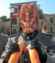 Turanj breaking a baguette