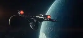 The USS Cayuga over Parnassus Beta