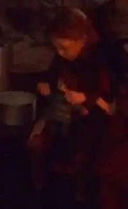 Young Kira Nerys holding a Bajoran doll