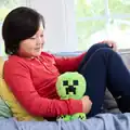 A child hugging a creeper.