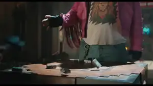 Garrett dumping iron ingots onto the table