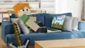 Alex playing Minecraft Solitaire on a computer