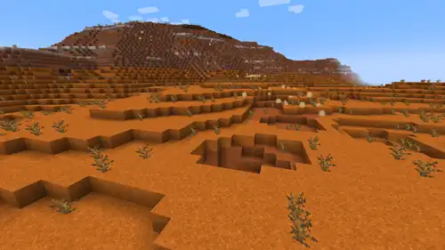 An image of a badlands biome in Minecraft