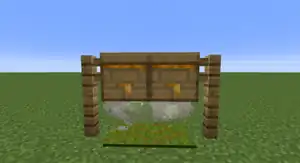 The campfire is set into the ground and covered by a carpet to prevent the fire from damaging the bees.