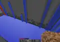A chunk error in an older Minecraft version revealing the void.