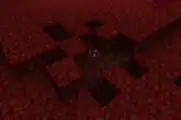 An erosion in a crimson forest, exposing nether quartz ore blob