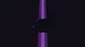 An End gateway block emitting a purple beam after teleporting an entity.
