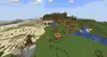A savanna village stretching across 4 different biomes.