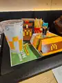 Jens action figure sitting on A Minecraft Movie meal from McDonald's