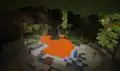A lava lake in a lush caves biome.