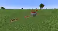 Minecart with TNT and activator rail for detonation.