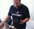 Notch unboxing his new hat.