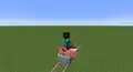 Steve riding a saddled pig in a minecart