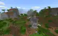 An old view of a shattered savanna in Bedrock Edition, with a lush green grass and foliage color.