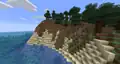 A taiga hills biome next to the sea.