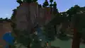 A large cliff in a taiga hills biome.