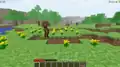 Mobs in a meadow with flowers