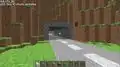 A player-built tunnel through terrain.