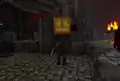 Wither skeleton wearing a jack o'lantern in the Nether.