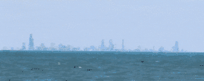 Comparison of Chicago being hidden by Earth's curvature2.gif