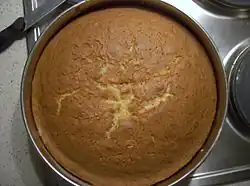 A cake in a round cake pan