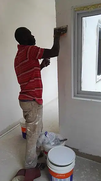 A home painter at work