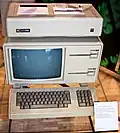 Apple Lisa with a ProFile hard drive on top