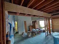 The soffit got a plywood case. More electrical and water connections; preparation work for the lighting