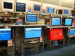 A shop selling HD televisions in 2007, a large improvement over the older SD displays.
