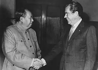 President Nixon shakes hands with Mao Zedong