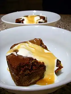 Sticky Toffee Pudding with custard and butterscotch sauce