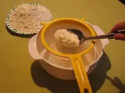 Sifting the dry ingredients