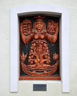 "Polish-Hungarian Madonna" by János Németh, a ceramic relief on wall in the market square in Krosno (2014).