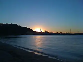 View of Ōkahu Bay at sunset, looking towards the Sky Tower