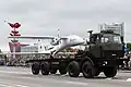 A military drone being carried by an offroad vehicle from MZKT.
