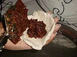 Fill with the mixture of jaggery and coconut