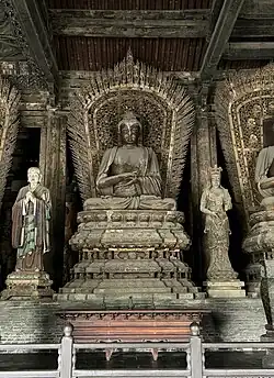 Jin Dynasty (1115–1234) statue of Ratnasambhava in Shanhua Temple in Datong, Shanxi, China