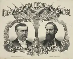 A campaign poster with two men's faces on it