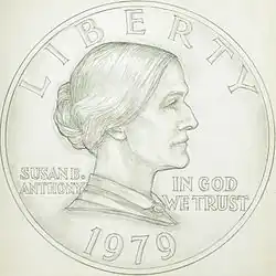 A drawing of one side of a coin, depicting the profile of a woman